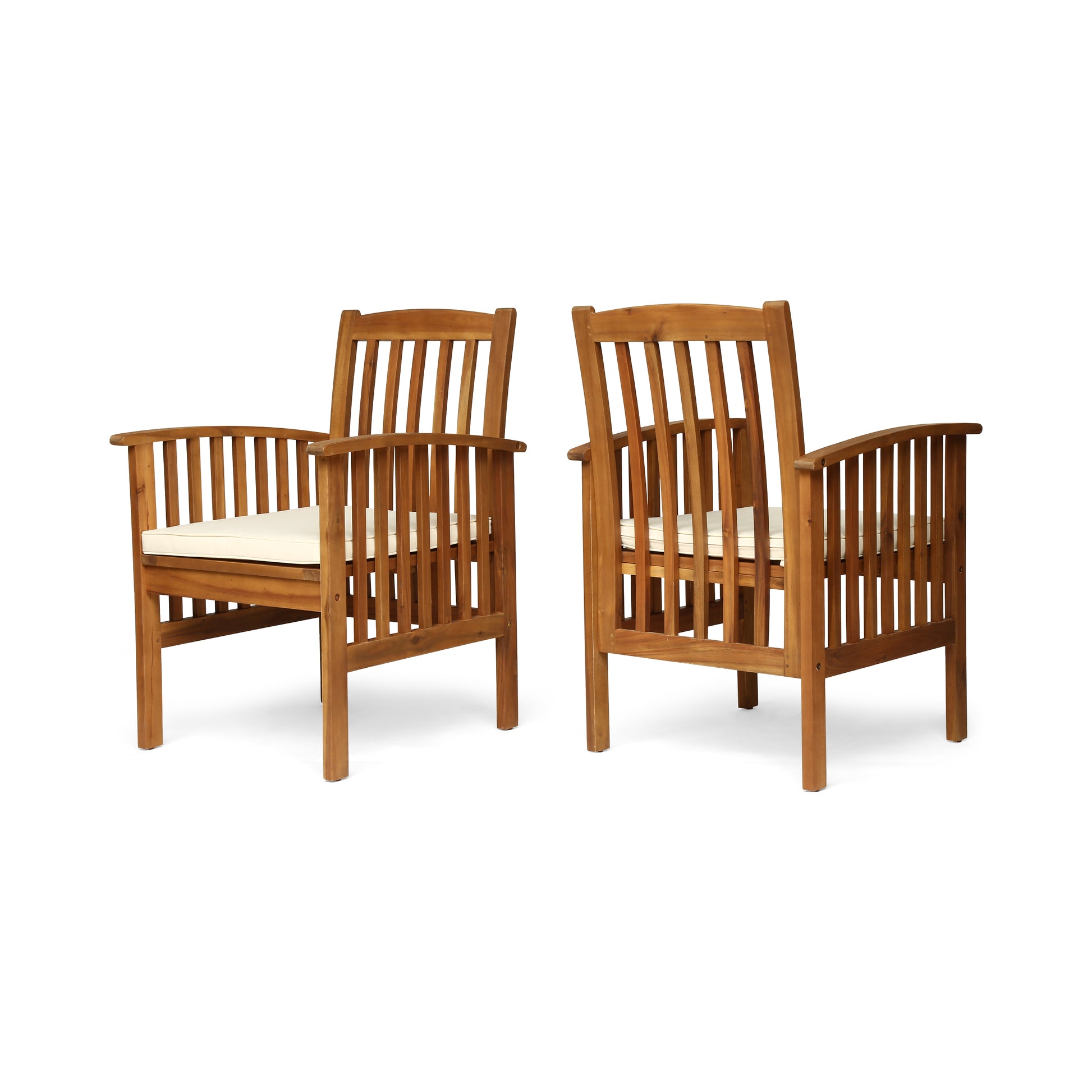 Two natural wood patio chairs with cream seat cushions
