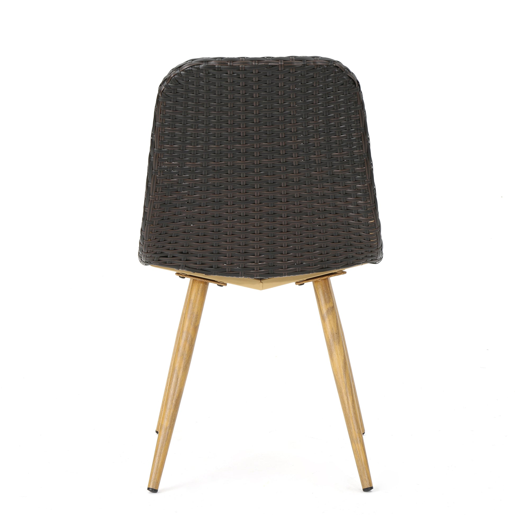 Dark brown rattan dining chair with tapered wooden legs