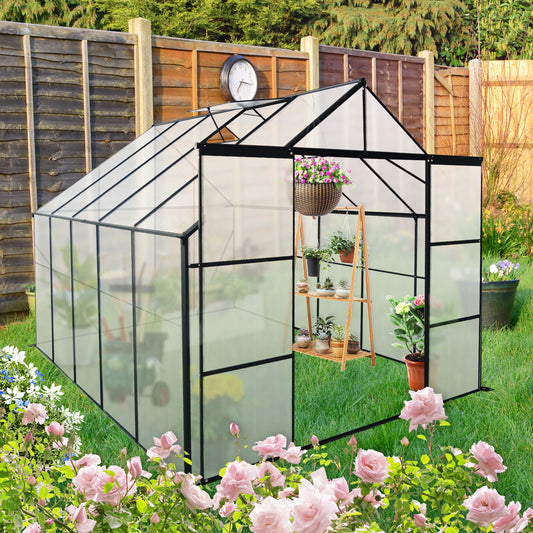 Large polycarbonate greenhouse with black metal frame ideal for yearround gardening