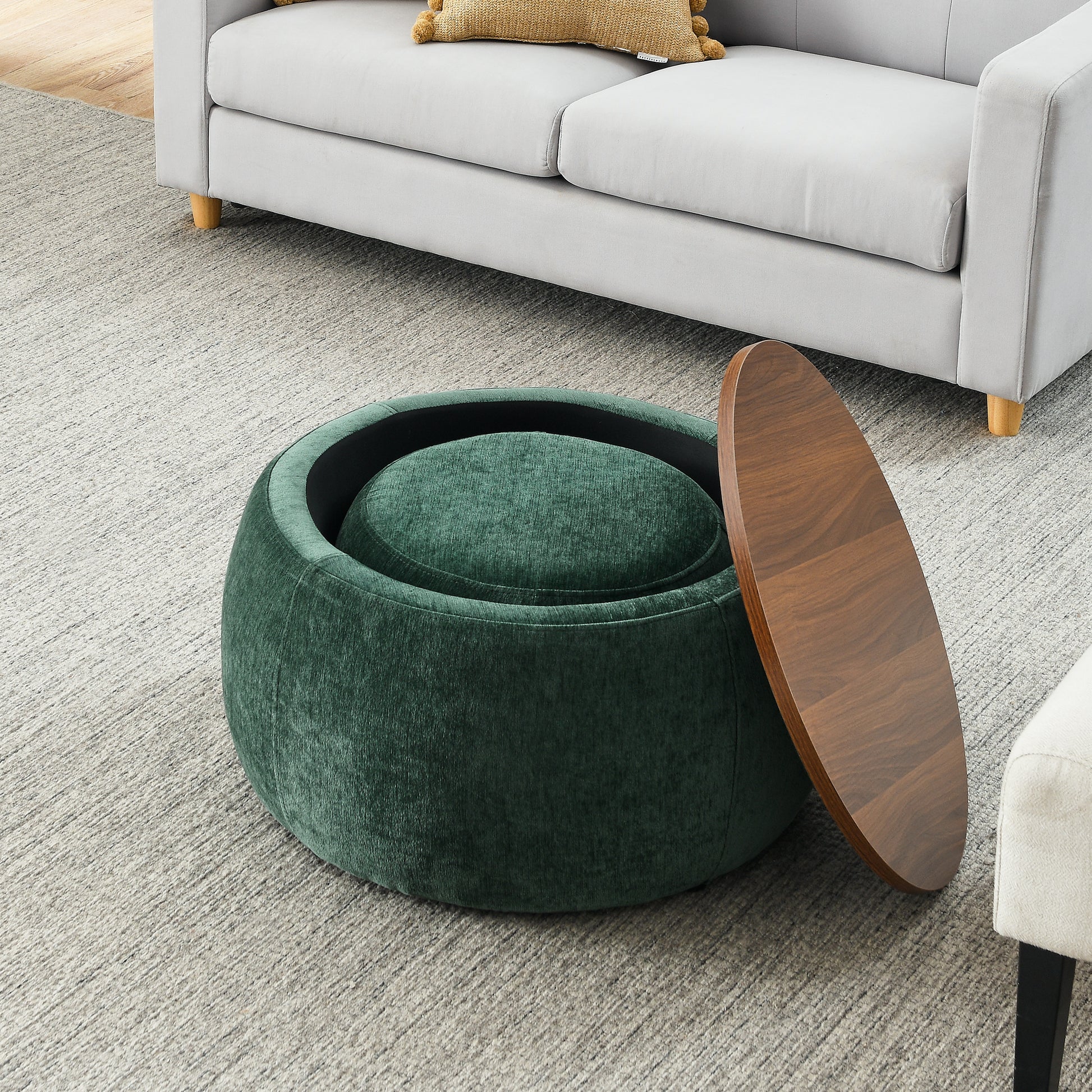 Round green velvet storage ottoman with open lid plush textured fabric accent
