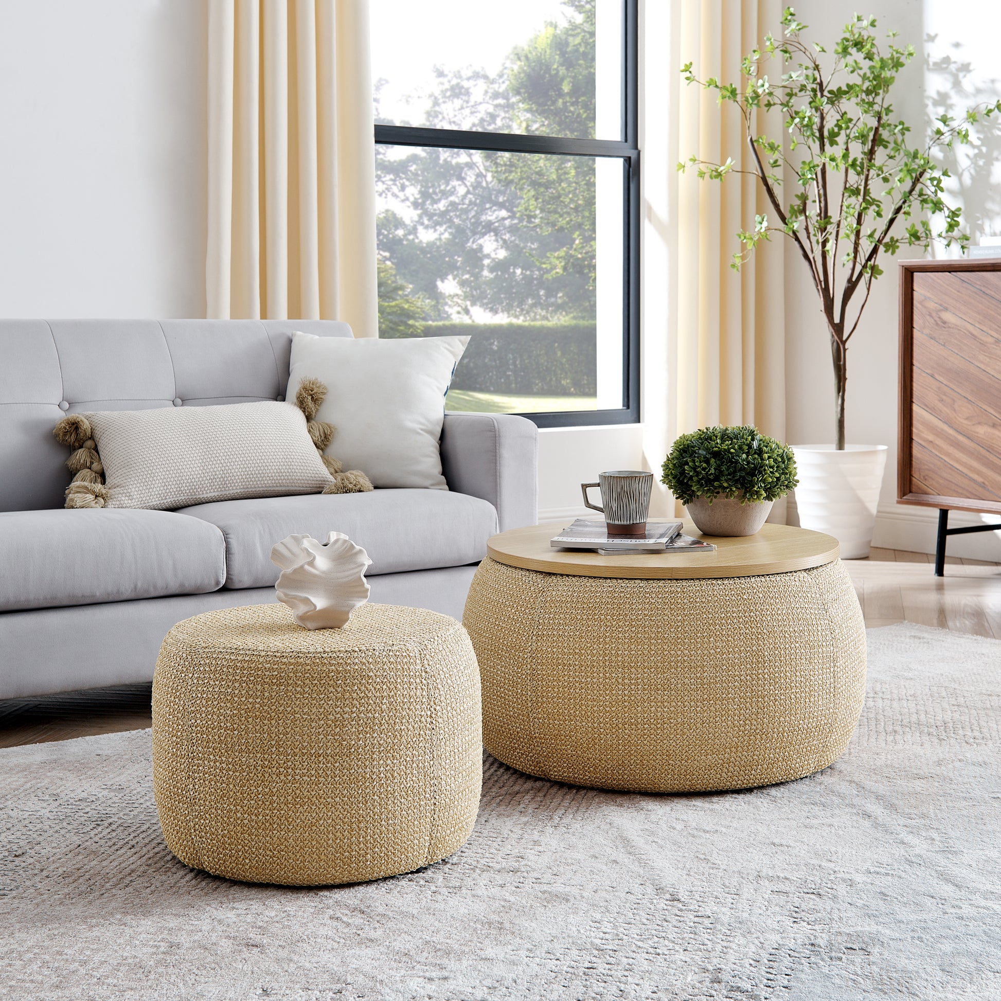 Round textured ottoman in natural jute weave perfect for a boho living room accent