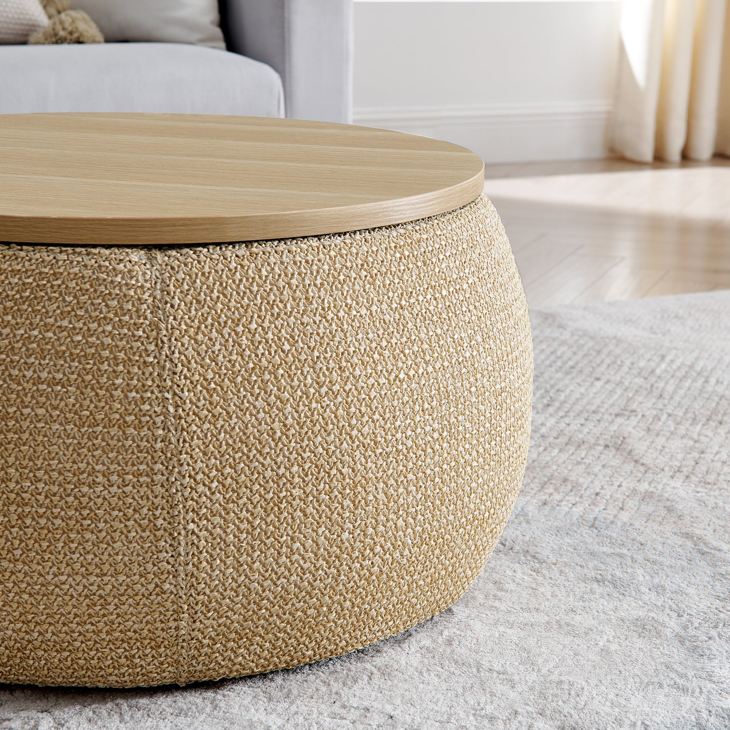 Round oaktop ottoman with woven jute base for living room use