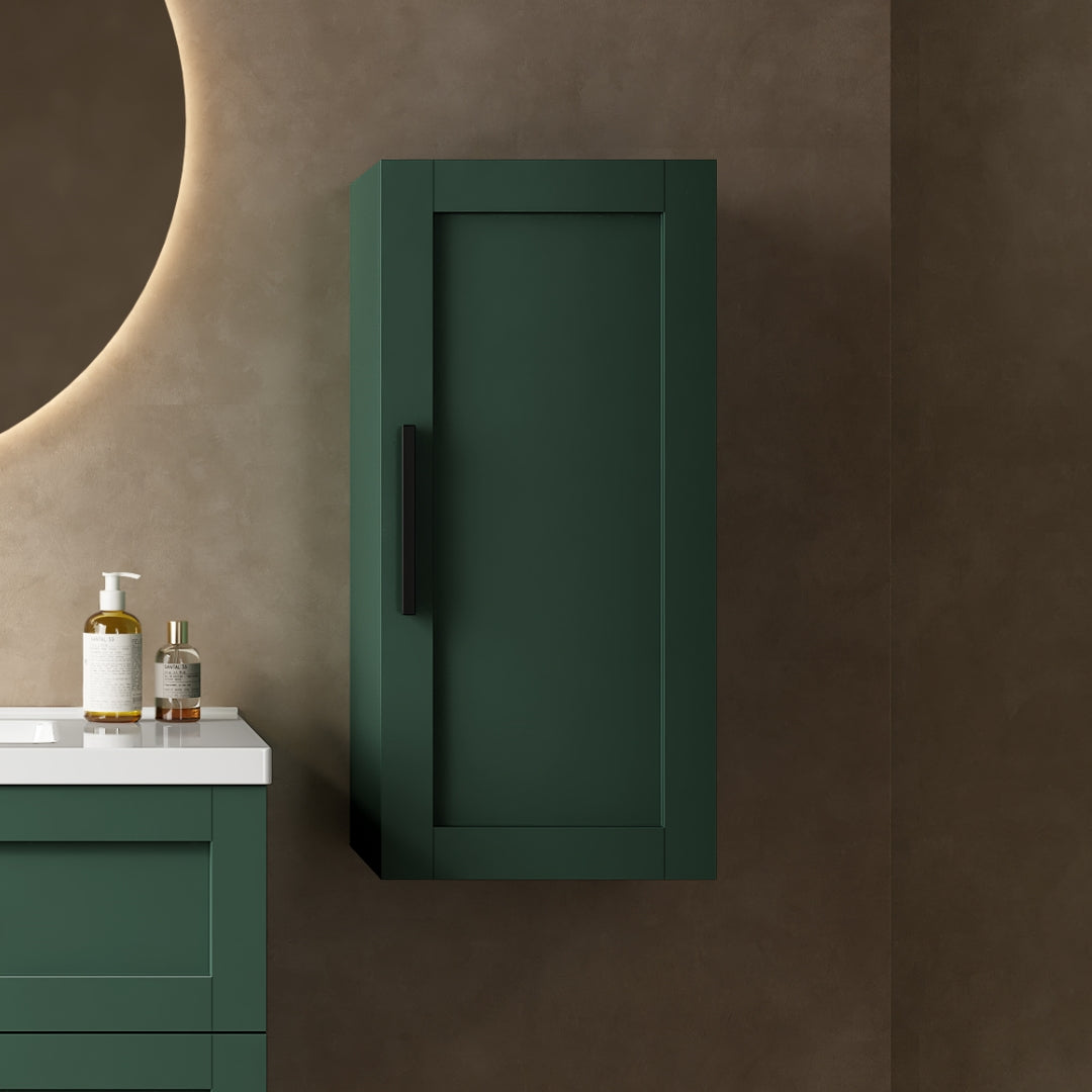 Dark green shakerstyle bathroom cabinet with black hardware mounted on textured wall