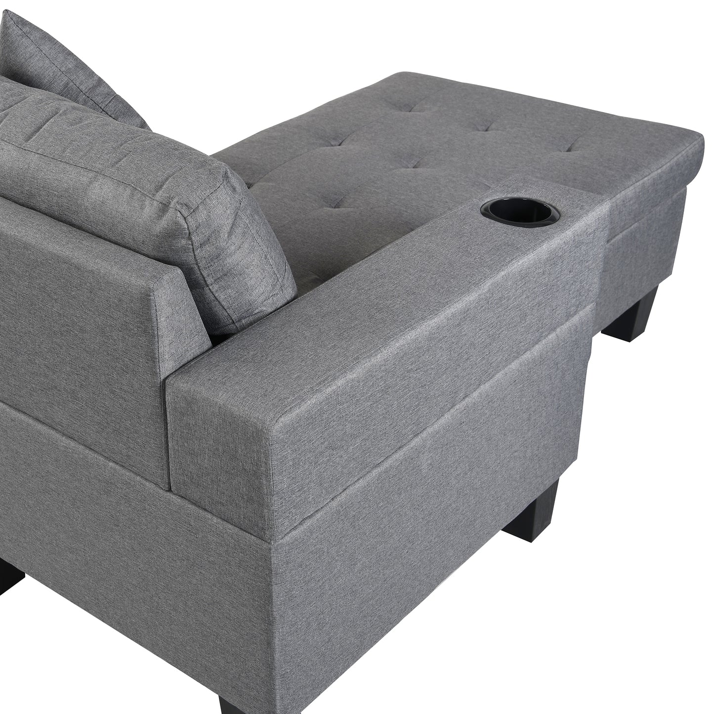 Grey fabric sectional sofa with tufted chaise and builtin cup holder