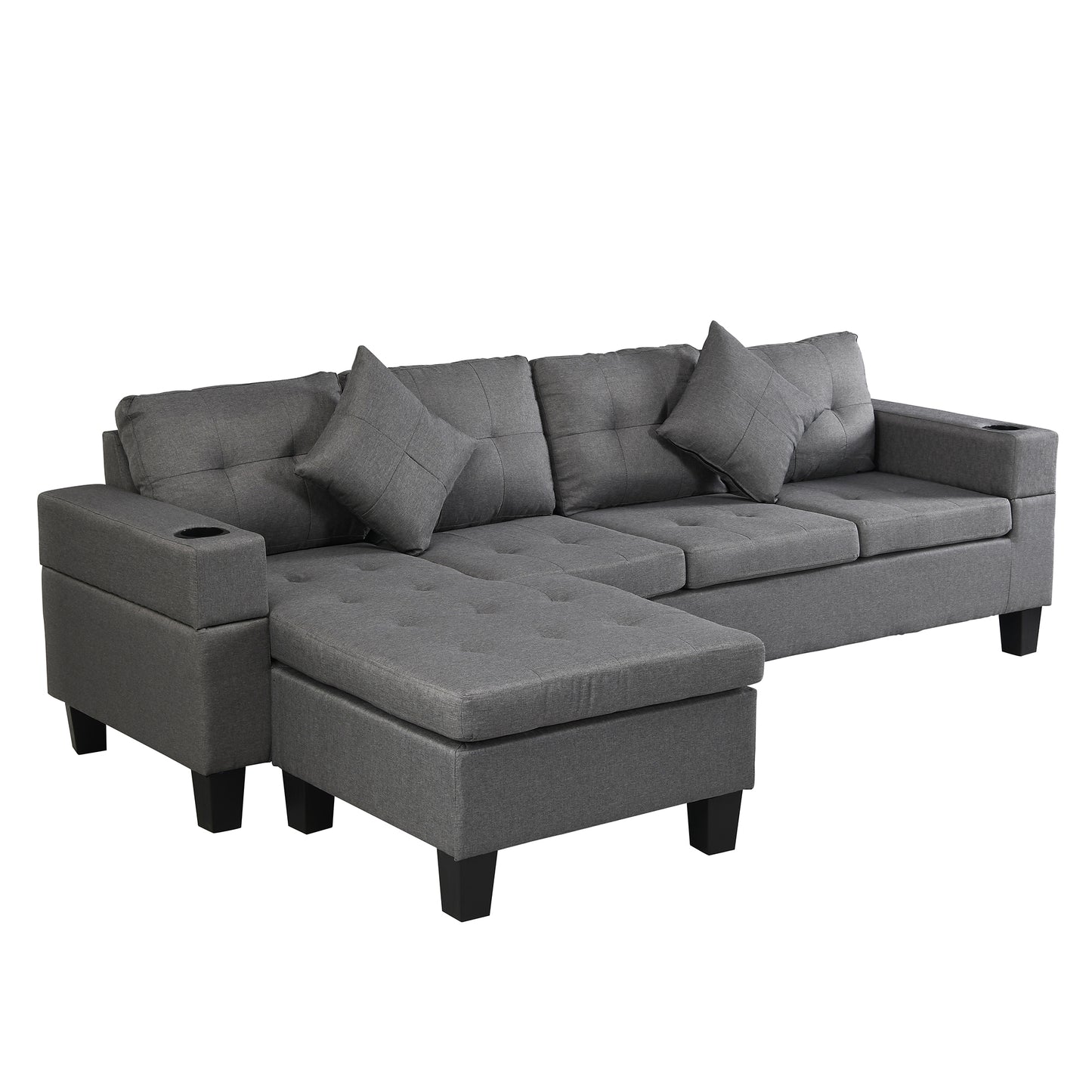 Dark grey fabric sectional sofa with tufted cushions and chaise lounge