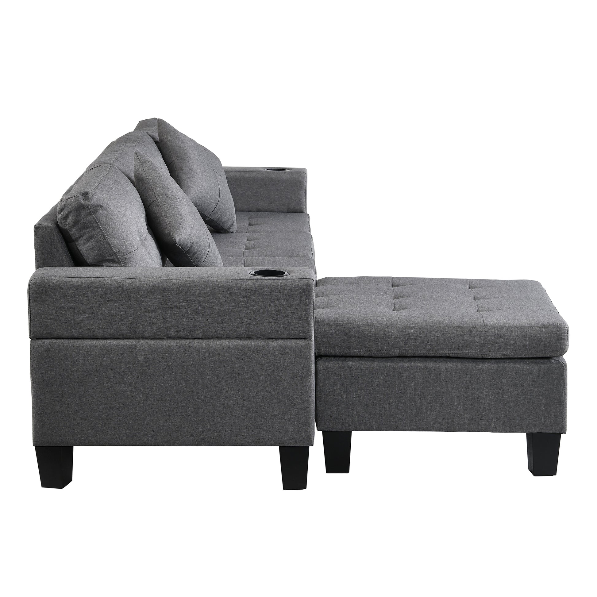 Dark grey upholstered sectional sofa with matching ottoman and builtin cup holders