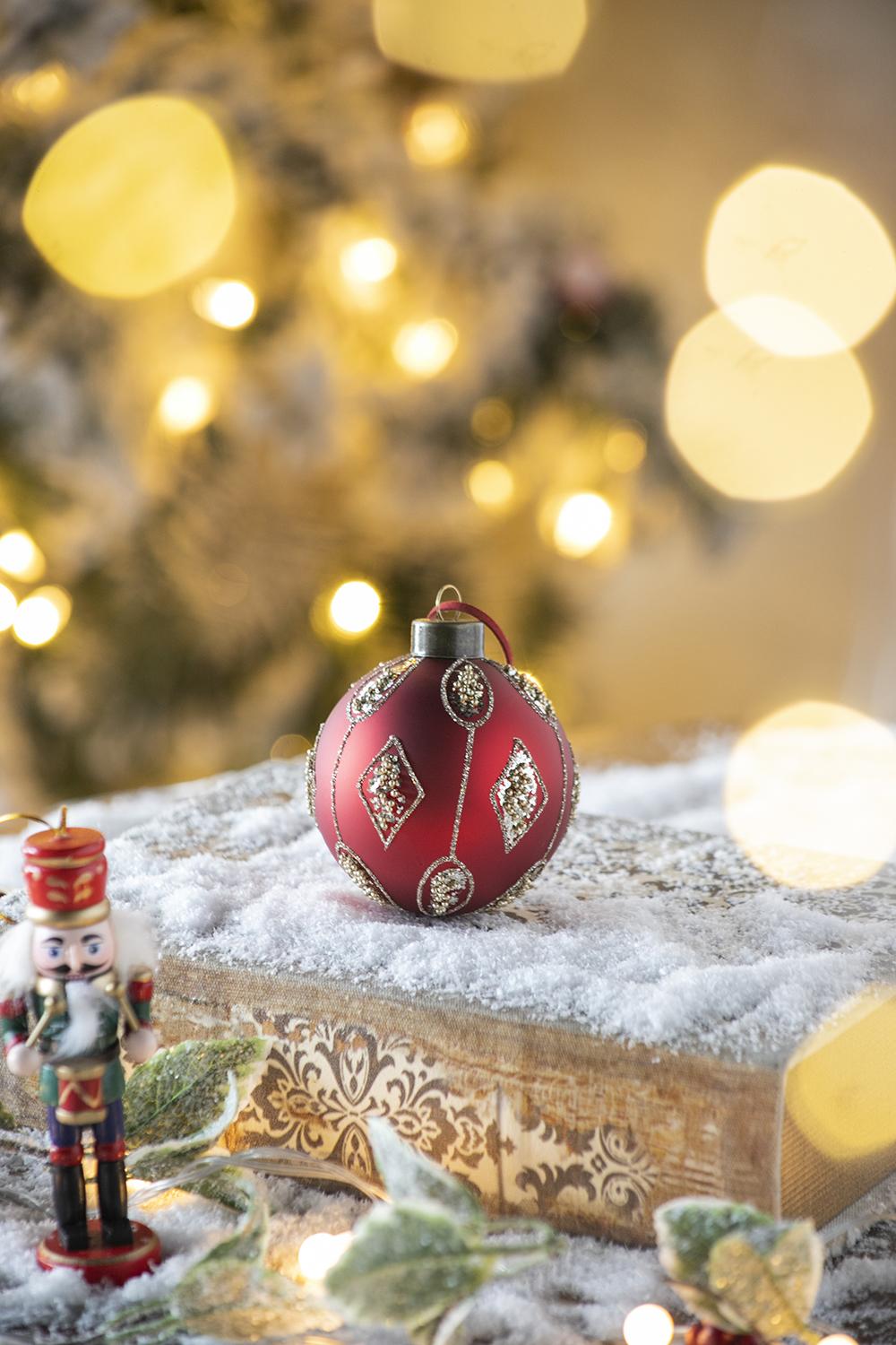 Elegant red Christmas ornament with gold glitter diamond pattern