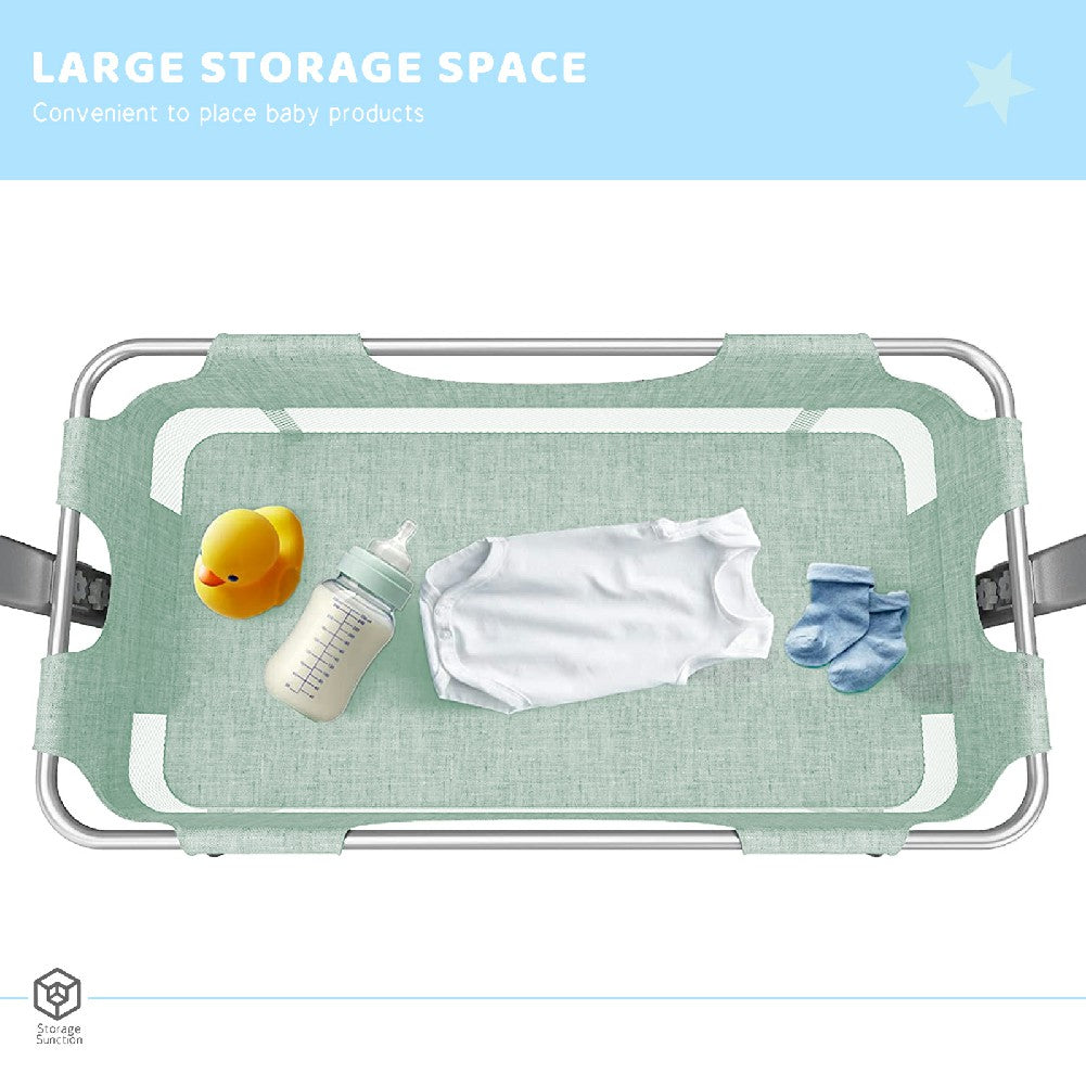 Light green mesh baby crib organizer with duck toy bottle bodysuit and socks