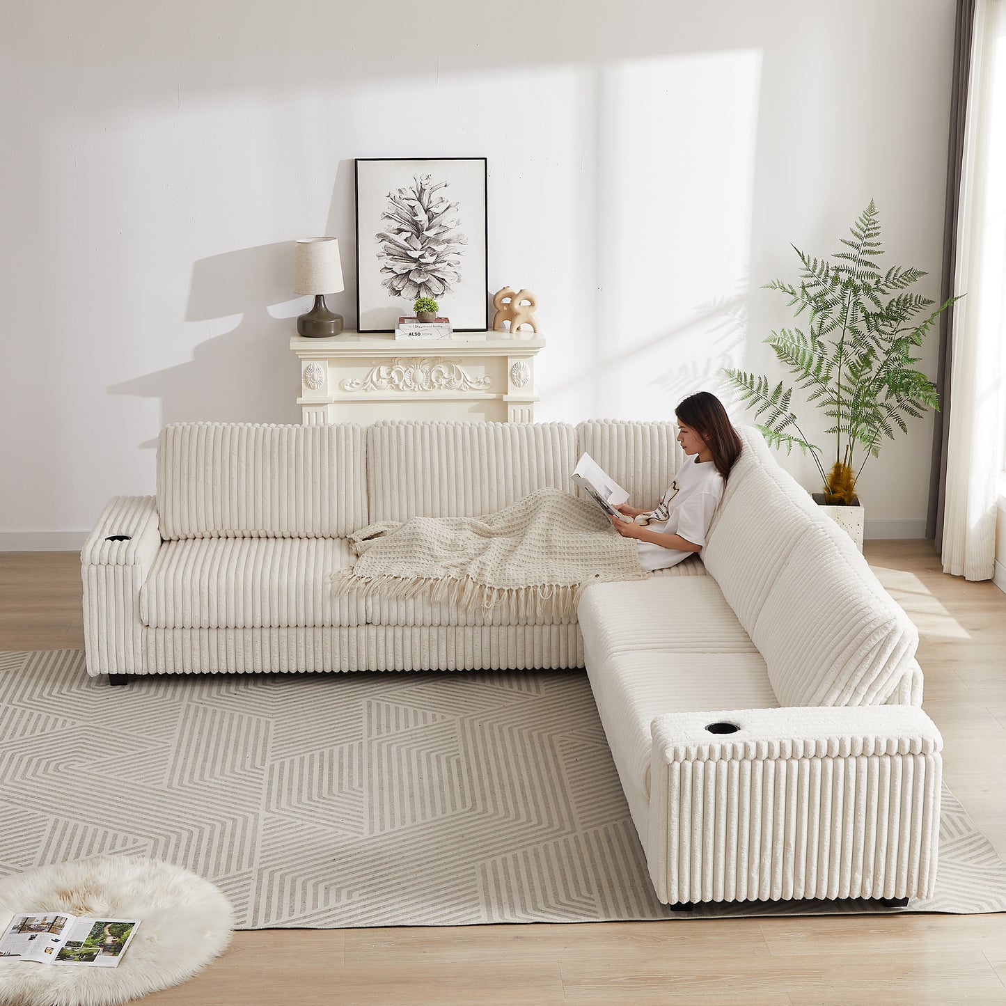 Cream corduroy sectional sofa with plush fabric and integrated cup holders for modern living rooms