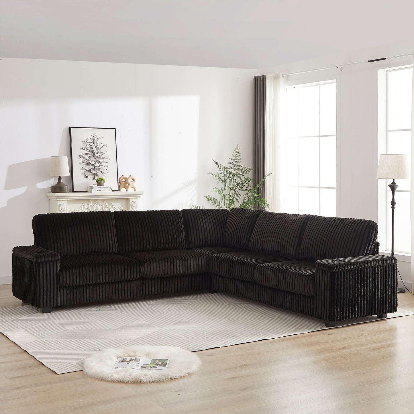 Dark corduroy sectional sofa with plush cushions in a modern living room