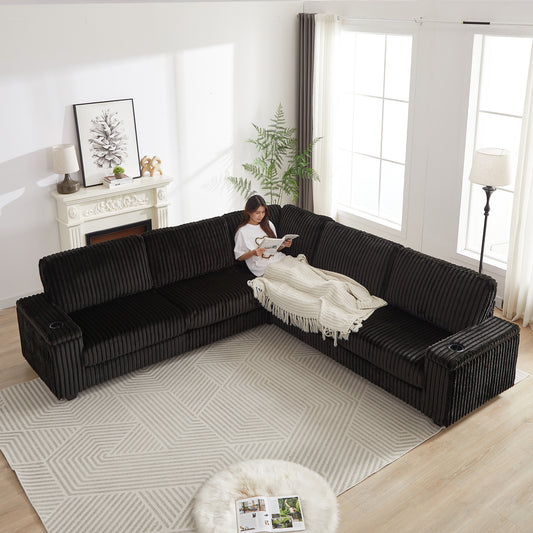 Spacious dark brown corduroy sectional sofa with integrated cup holders and a comfortable throw