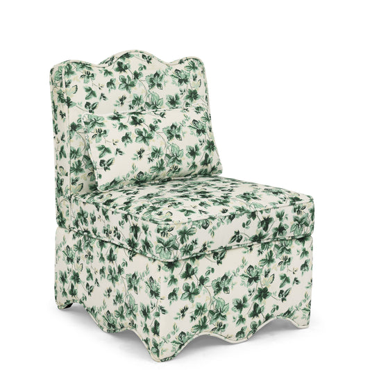 Tufted slipper chair with scrolling botanical print fabric in green and cream