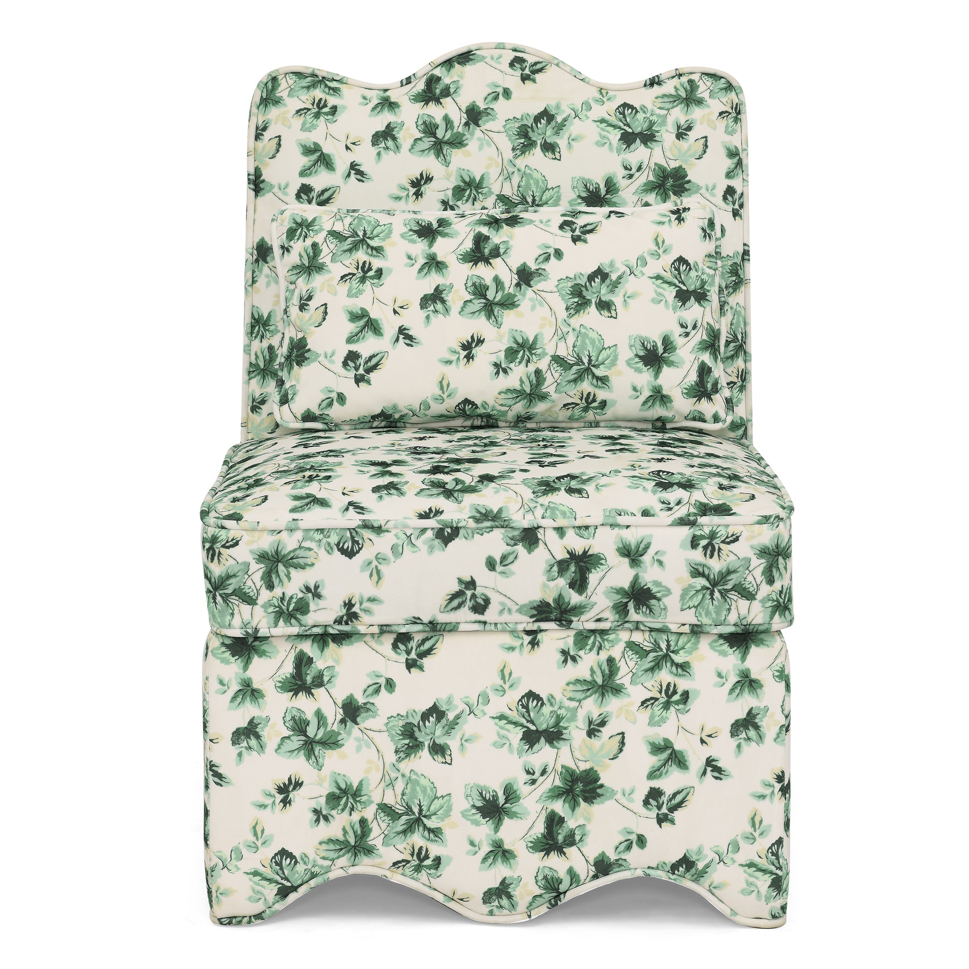 Cream fabric accent chair with a vintage green floral print perfect for a cozy reading nook