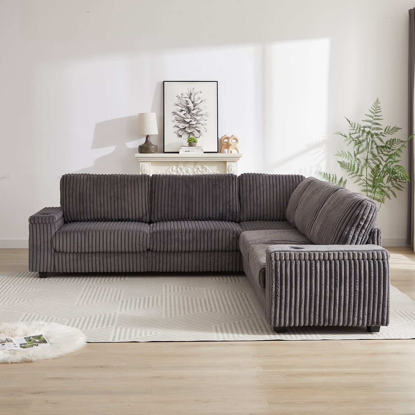 Dark grey corduroy fabric sectional sofa with plush cushions and a modern design