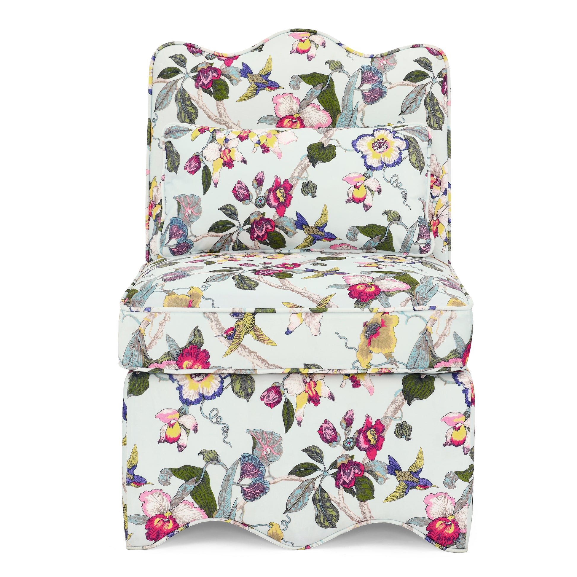 Light blue accent chair with a vibrant floral and bird print pattern