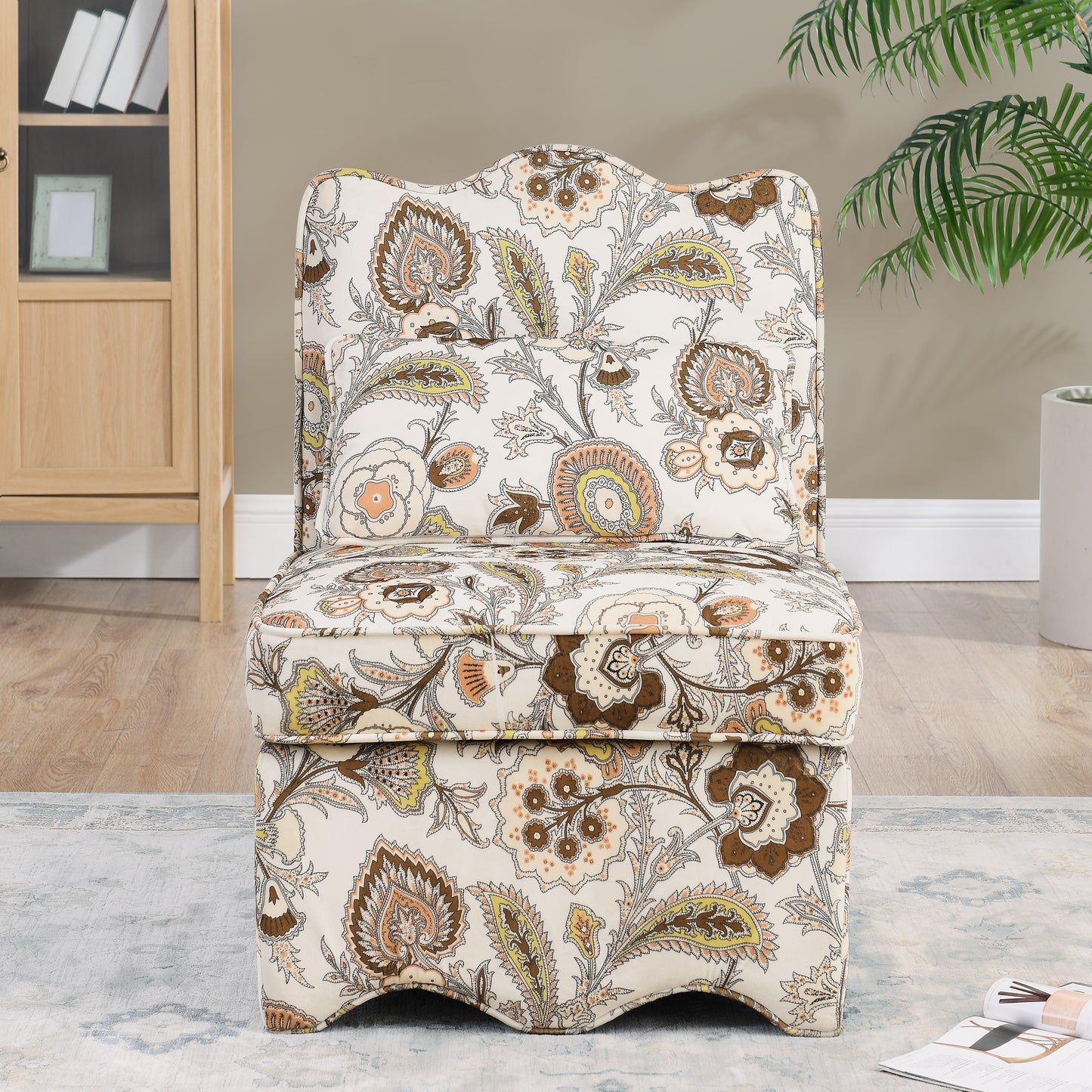 Cream accent chair with a vintage paisley floral print in brown peach and green