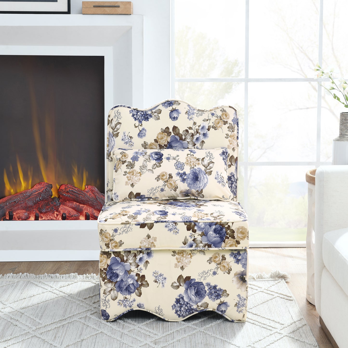 Cream accent chair with blue and beige floral print fabric