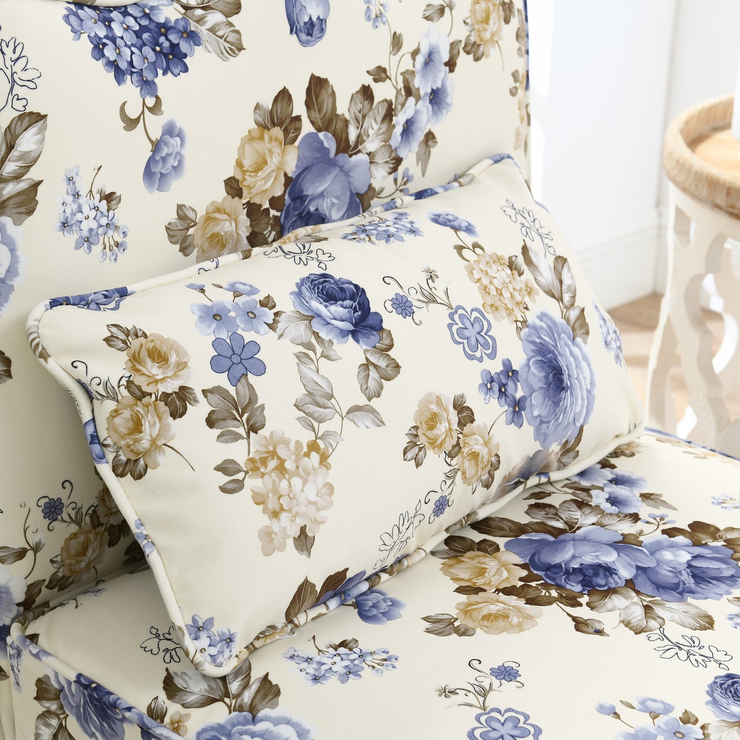 Cream accent pillow with vintage blue and yellow floral print
