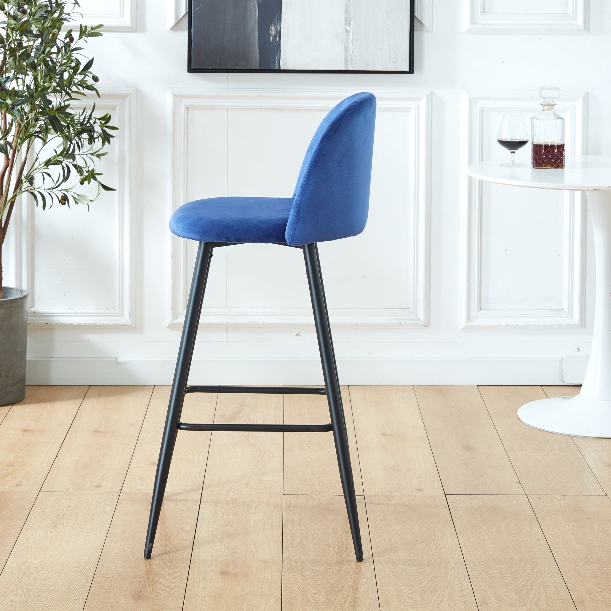 Blue velvet upholstered bar stool with black metal legs elegant modern design