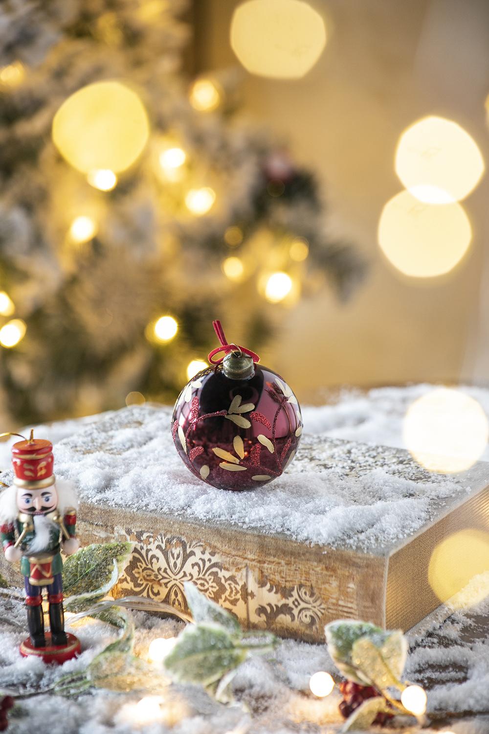 Burgundy glass Christmas ornament with gold leaf pattern perfect festive decor