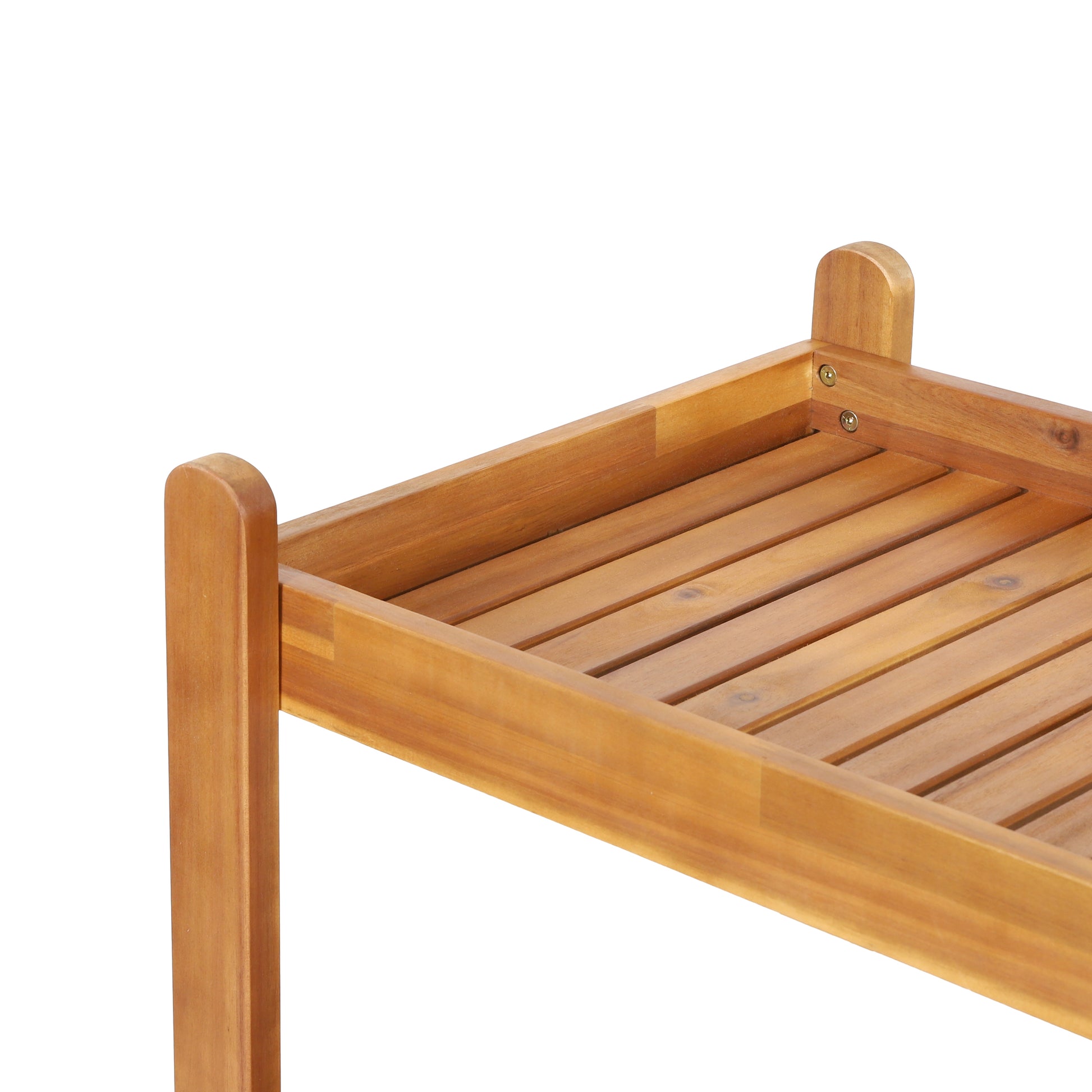 Corner view of a natural wood plant stand with slatted shelves