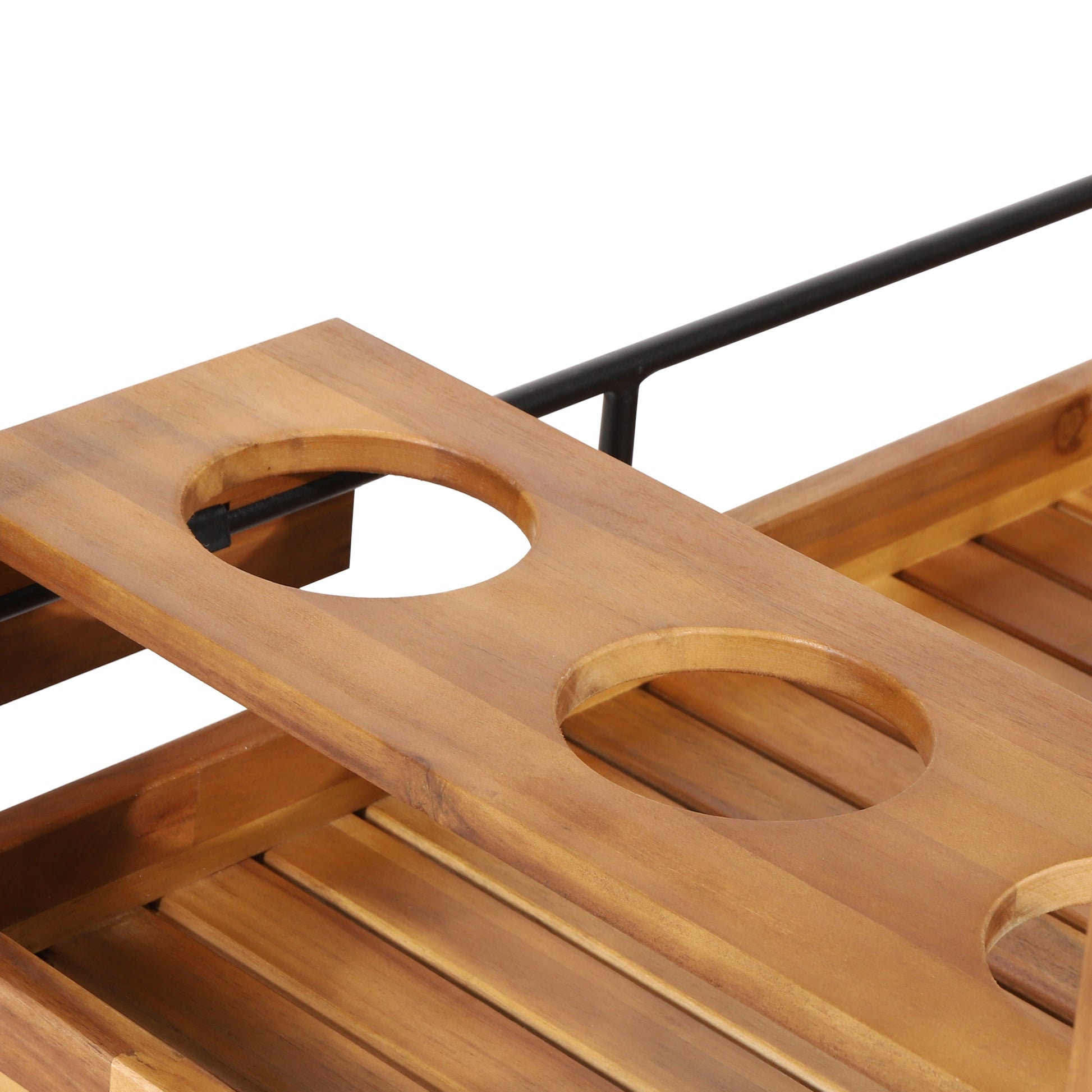 Wooden bathtub caddy with two circular cup holders and black metal accents