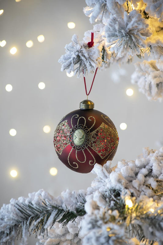 Burgundy glass Christmas ornament with cameo and sequins