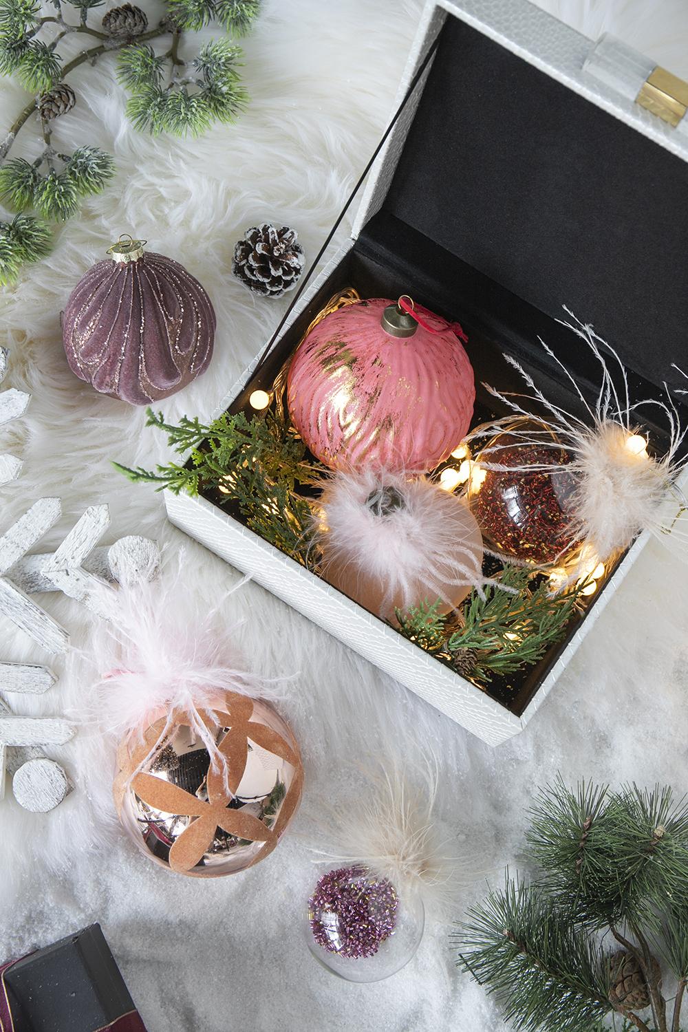 Glittered mauve velvet Christmas ornament with gold swirls perfect for festive decor