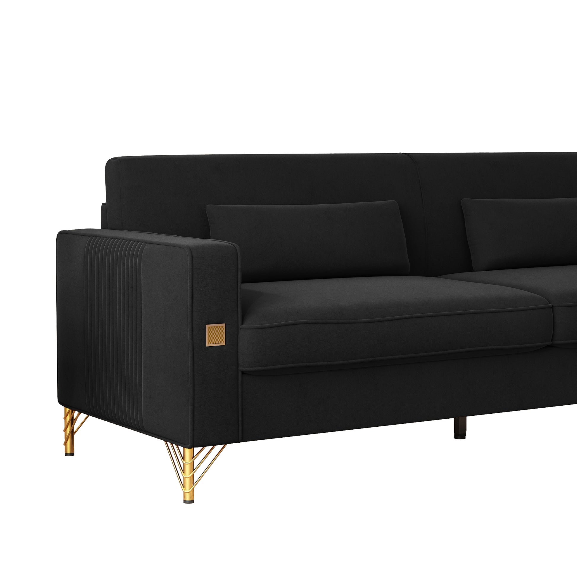 Black velvet sofa with gold accents and pleated armrest for modern living room
