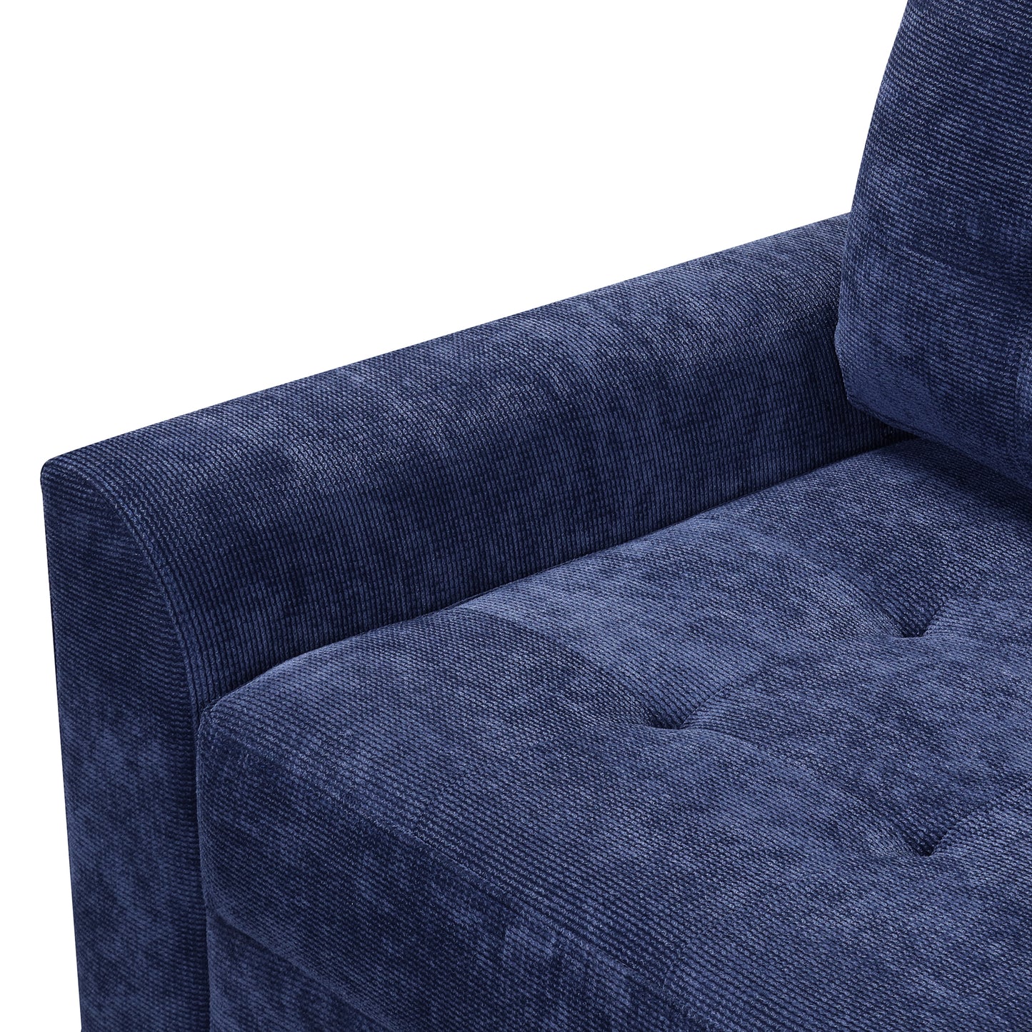 Dark blue textured fabric sofa armrest with tufted seat detail