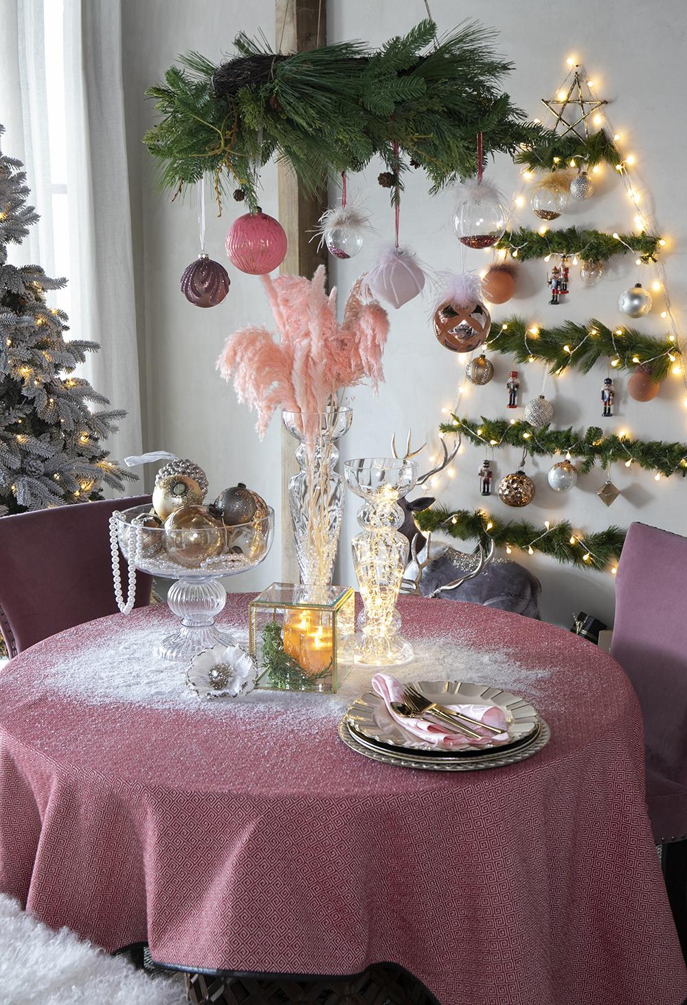 Pink diamond pattern tablecloth with festive Christmas decor
