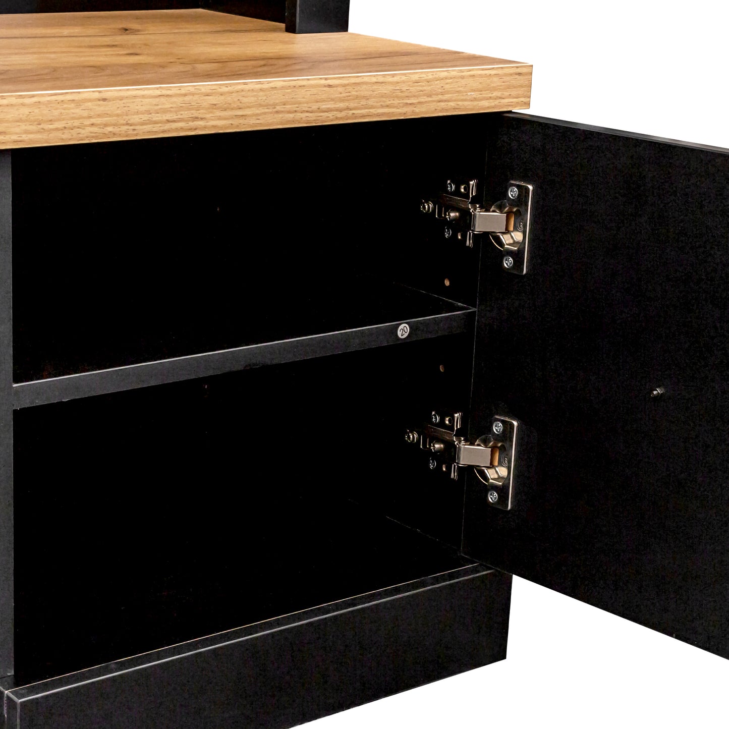 Black particleboard media console with a wood grain top and open cabinet door revealing shelves
