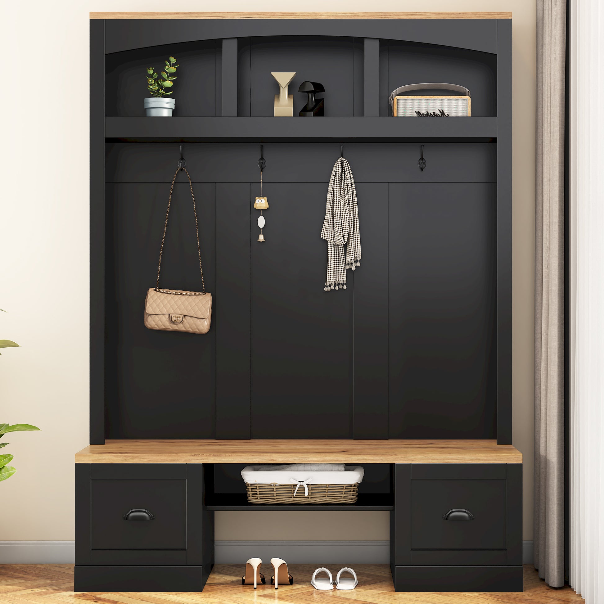 Black hall tree with oak top featuring coat hooks storage cubbies and drawers for entryway organization