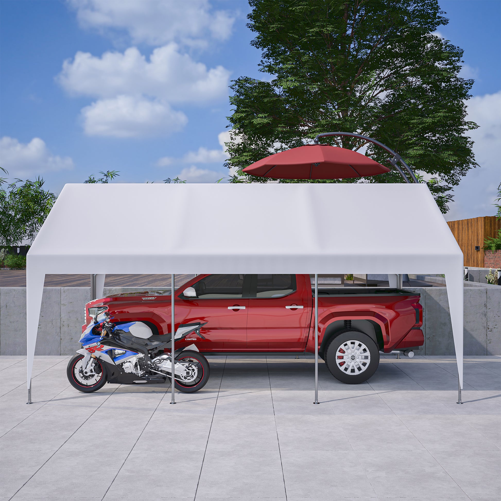 White canopy providing shelter for a red truck and a blue and white motorcycle