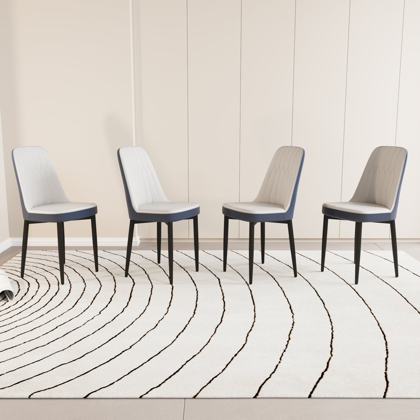 Four modern dining chairs with white padded seats and navy blue borders on black legs