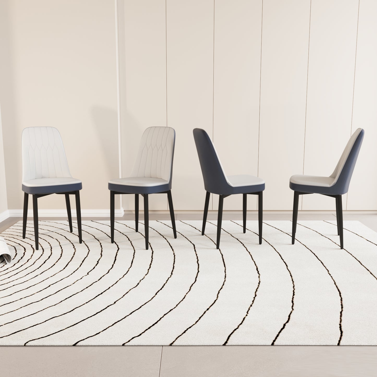 Four modern dining chairs with cream upholstery and navy accents on black legs