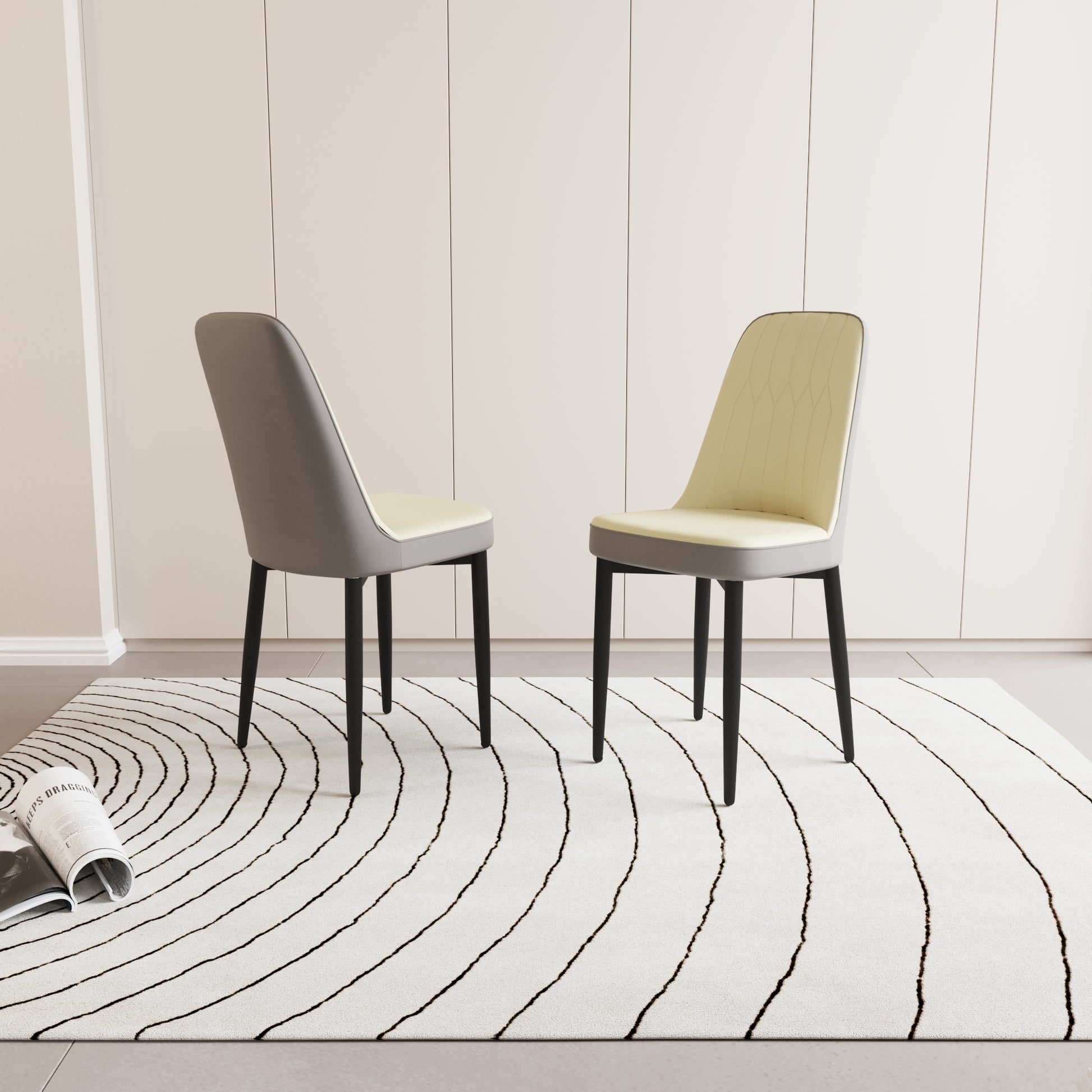 Modern dining chairs with grey and cream upholstered seats and black metal legs