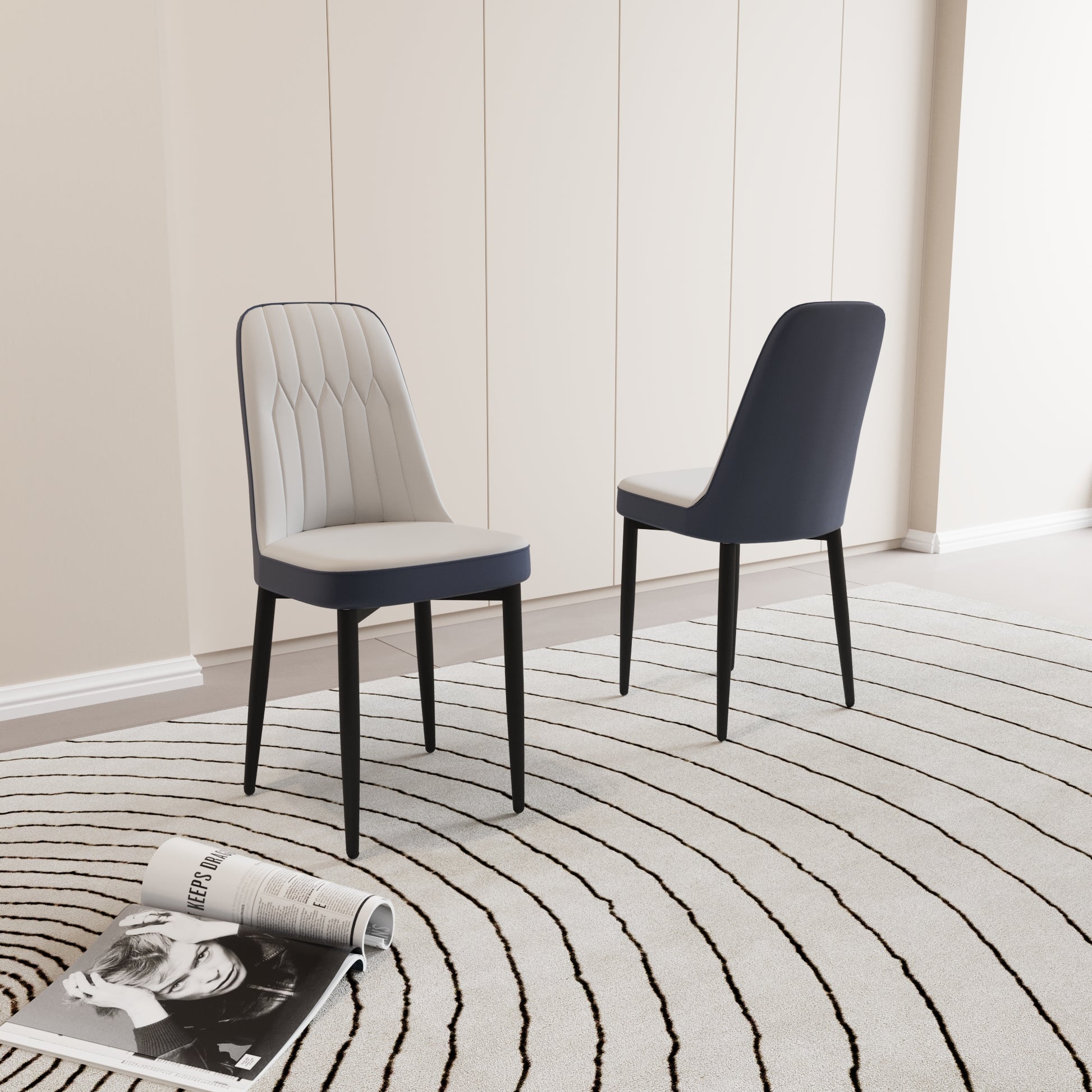 Light grey upholstered dining chair with navy trim and dark wood legs