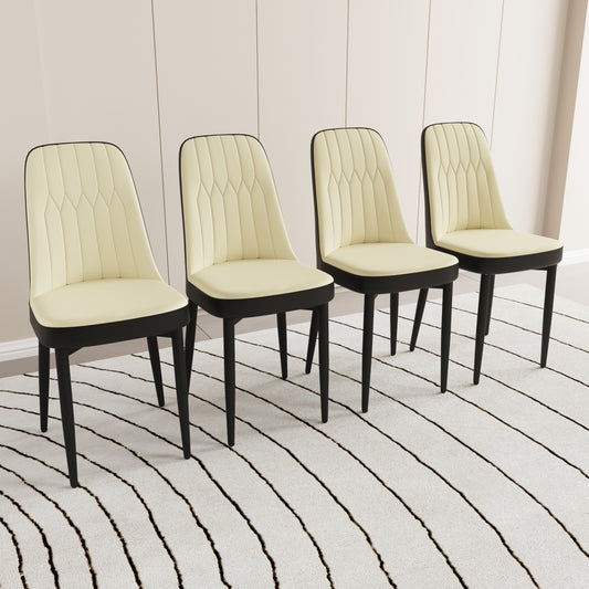Four upholstered dining chairs with creamcolored seats and backs featuring black legs