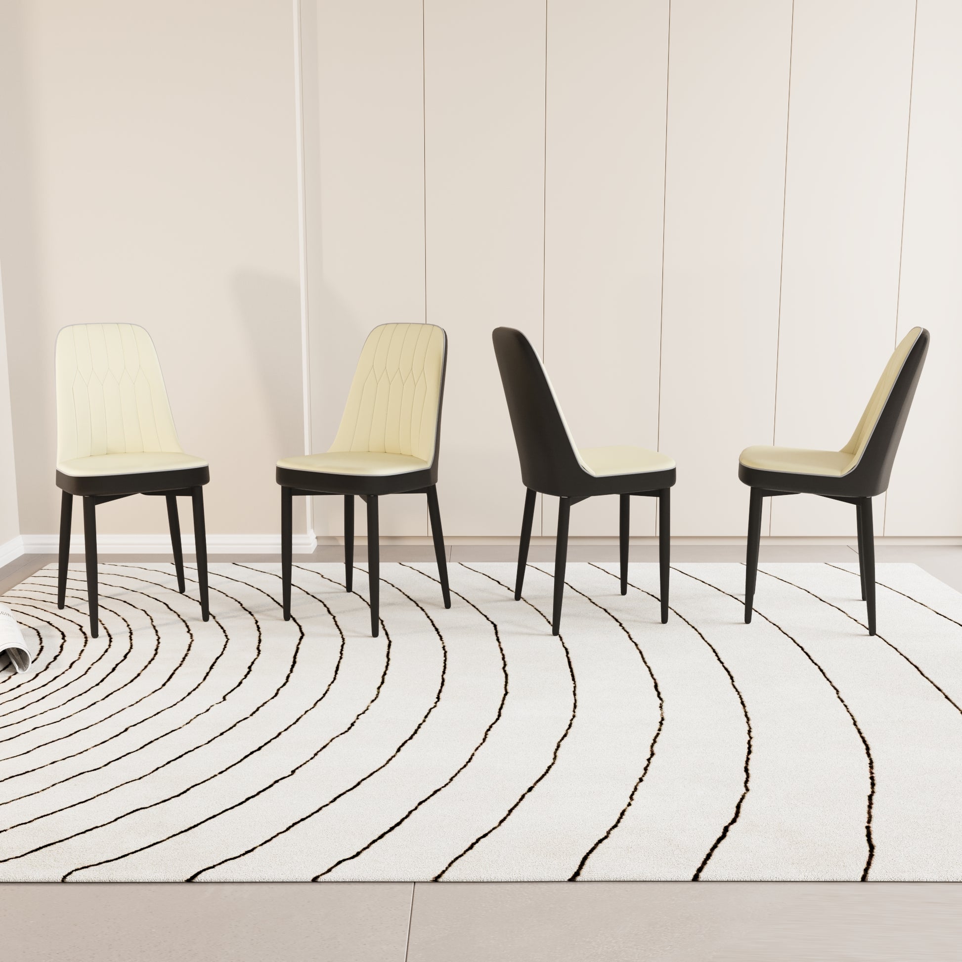 Cream upholstered dining chairs with black legs arranged on a modern rug