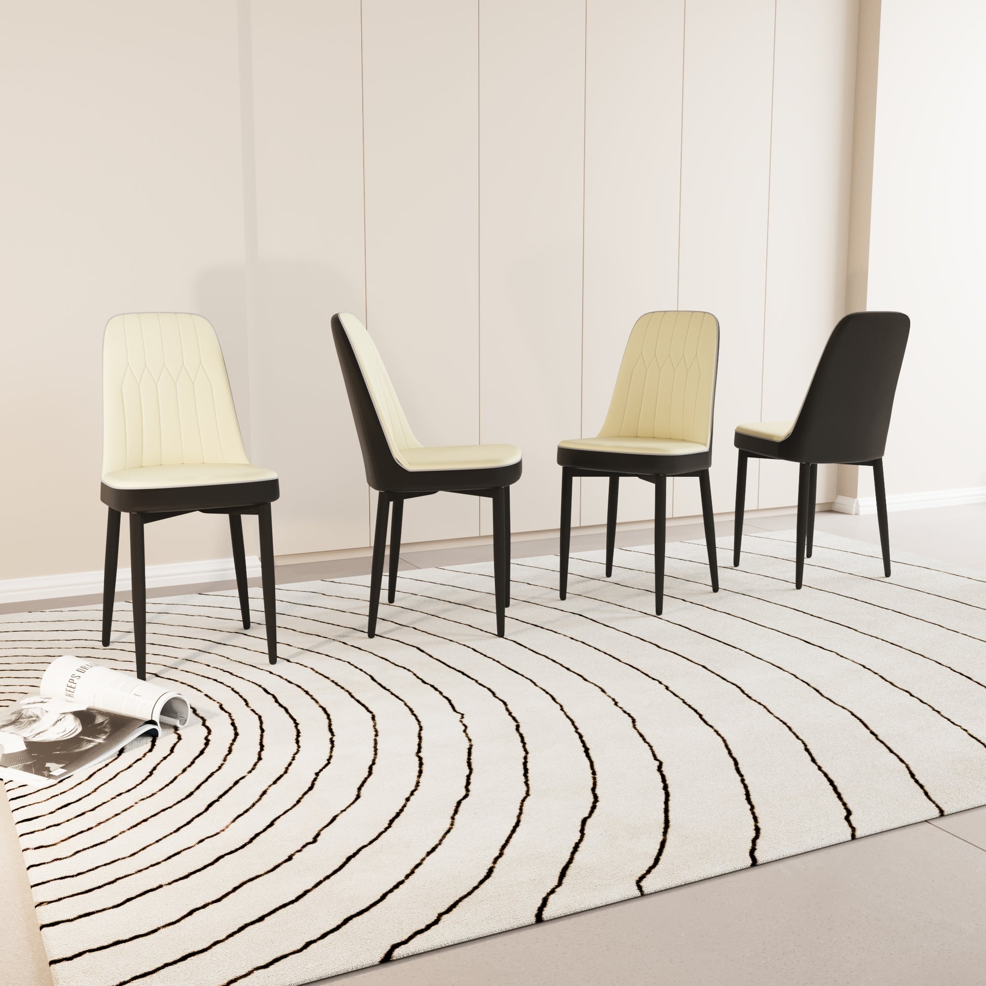 Four modern dining chairs with cream upholstery and black legs
