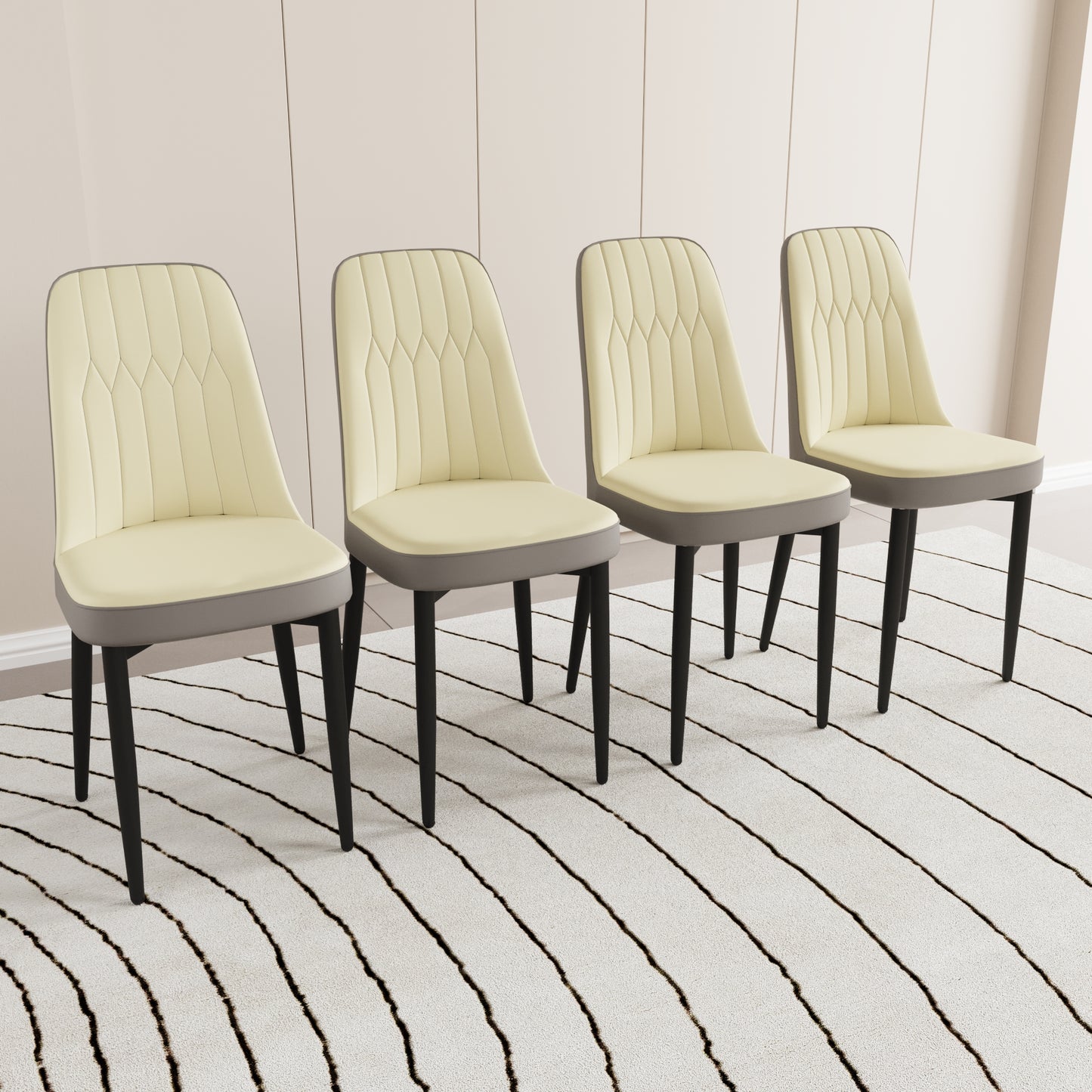 Modern dining chairs in cream faux leather with diamond quilting and charcoal base