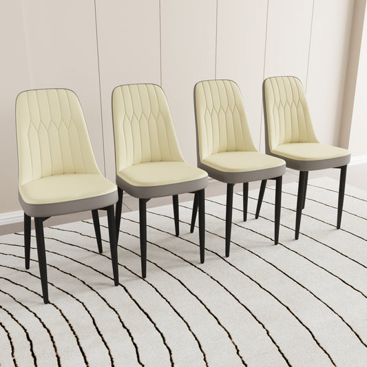 Modern dining chairs in cream faux leather with diamond quilting and charcoal base