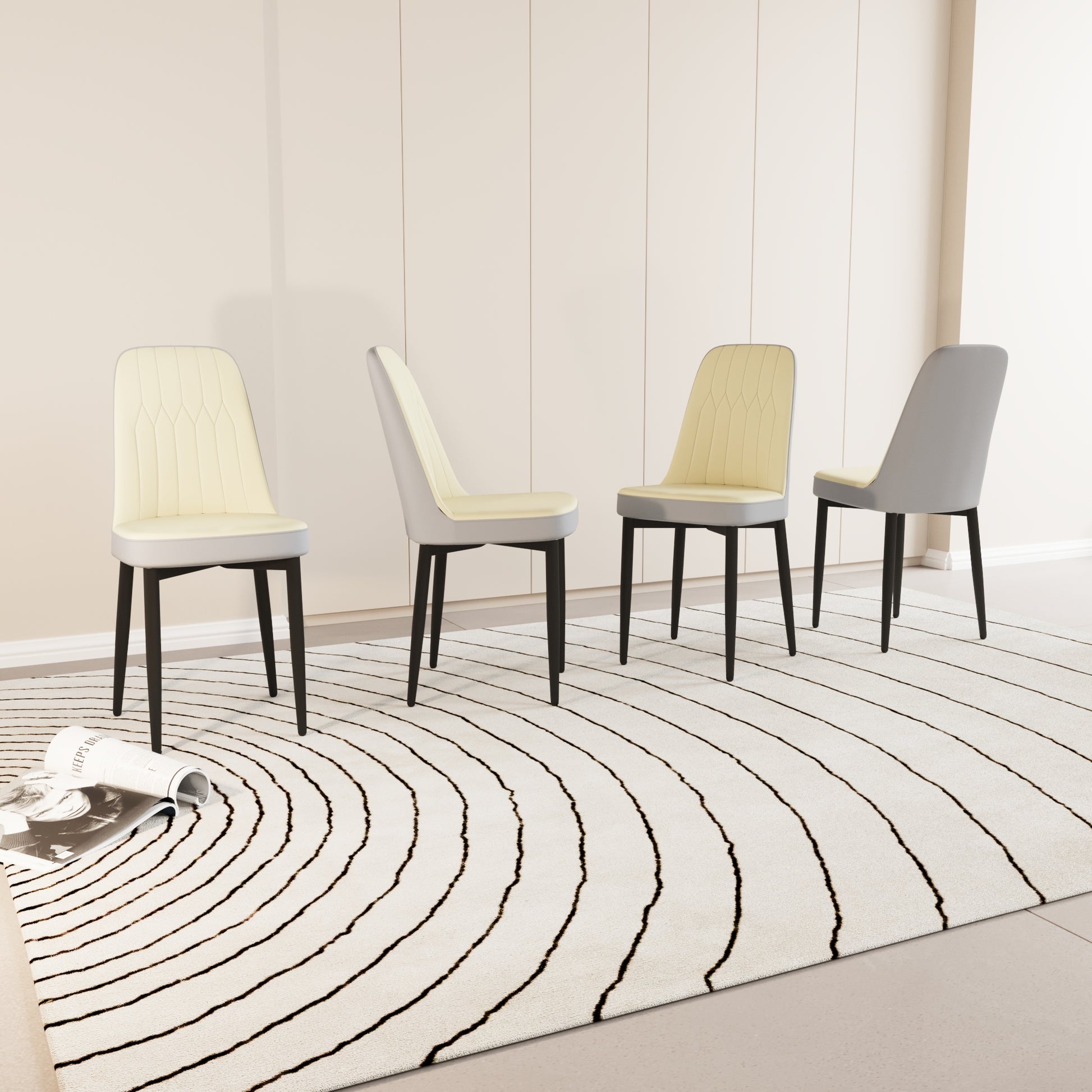 Four modern dining chairs with upholstered cream seats and grey backs on dark legs