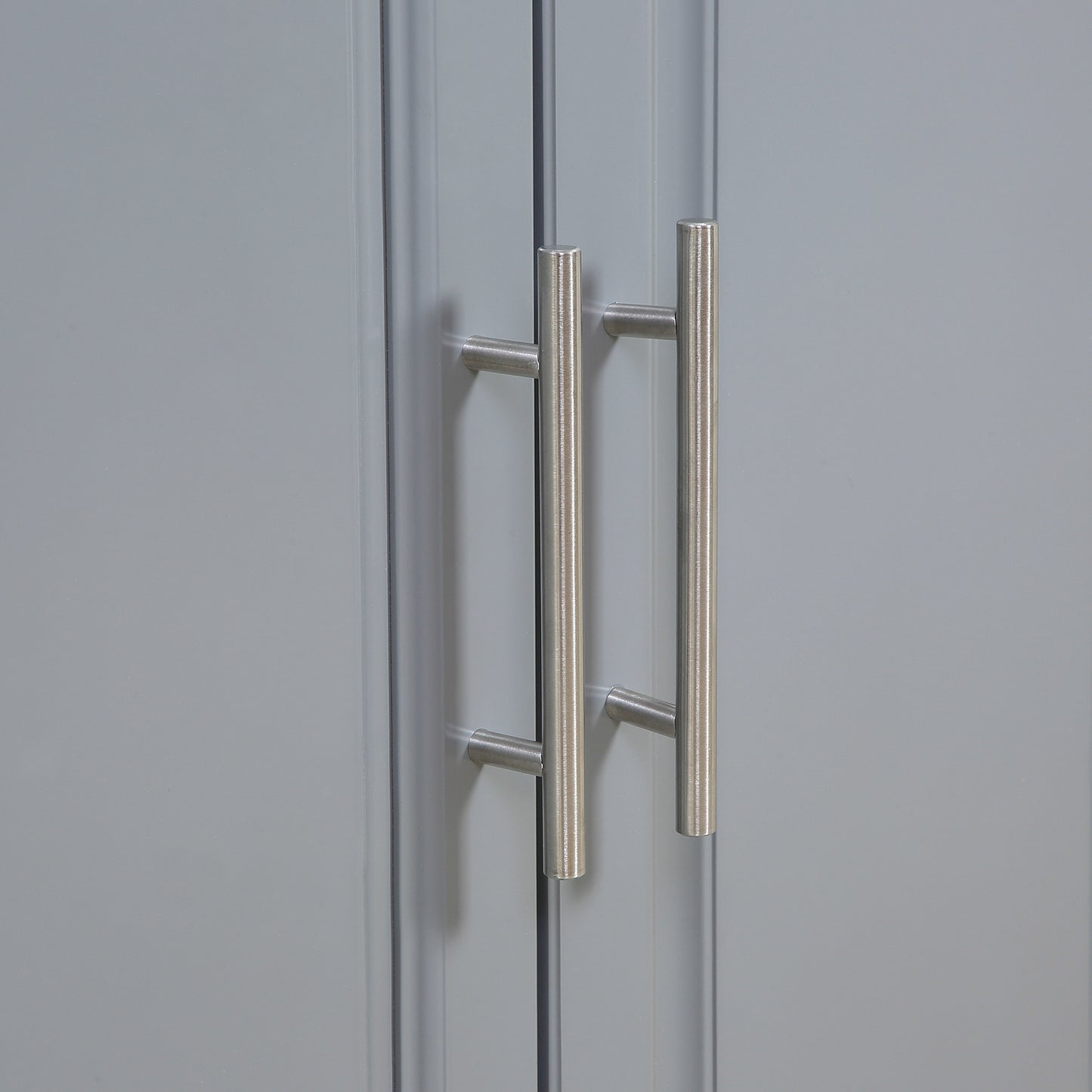 Brushed nickel cabinet handles on grey doors