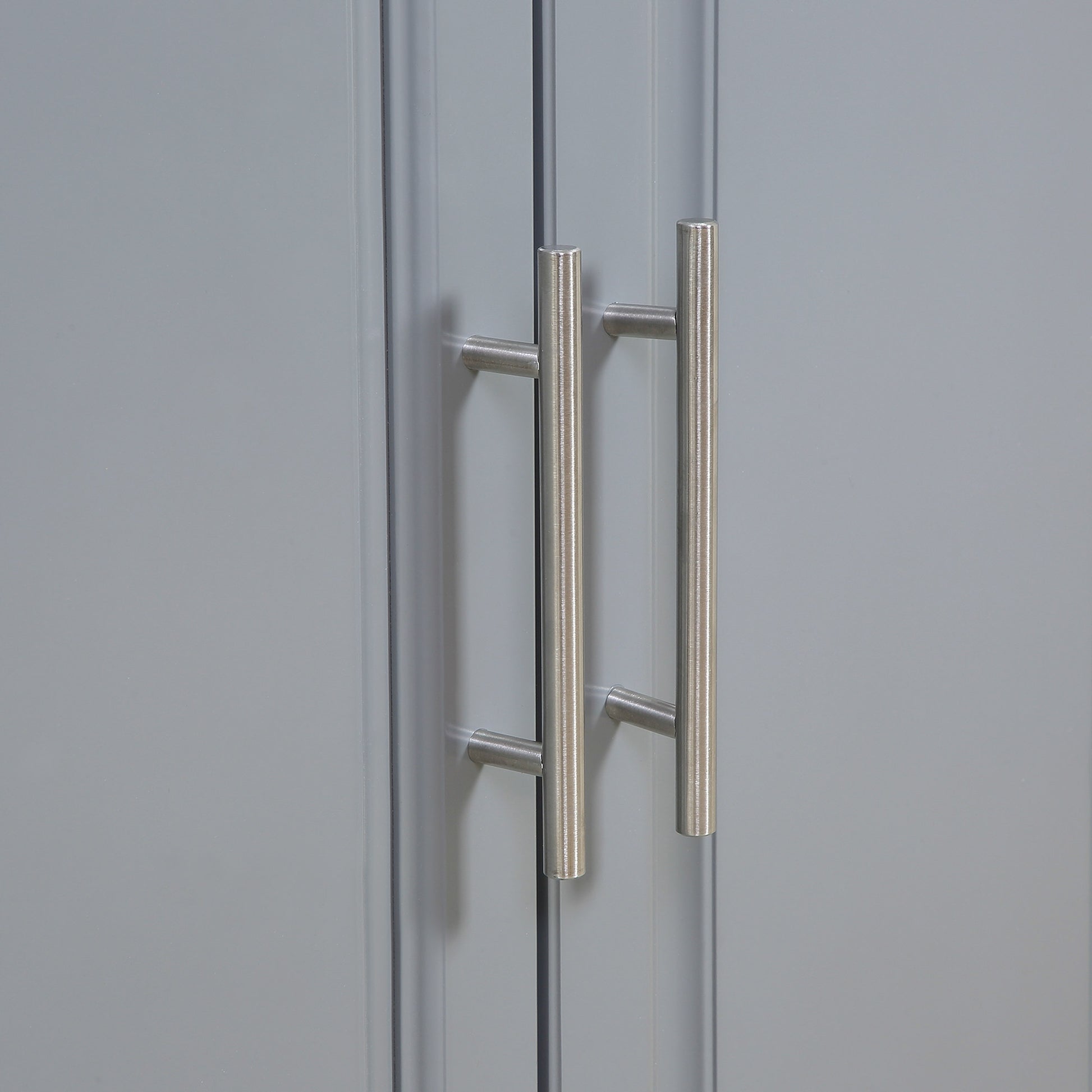 Brushed nickel cabinet handles on grey doors