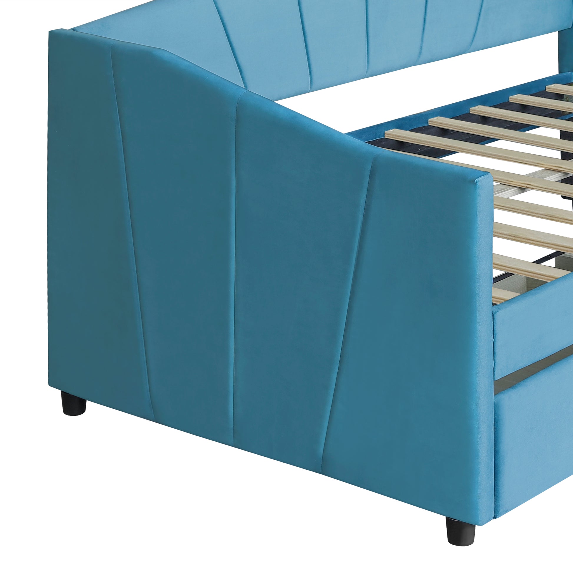 Teal velvet daybed with padded channel tufted back showcasing wood slat support