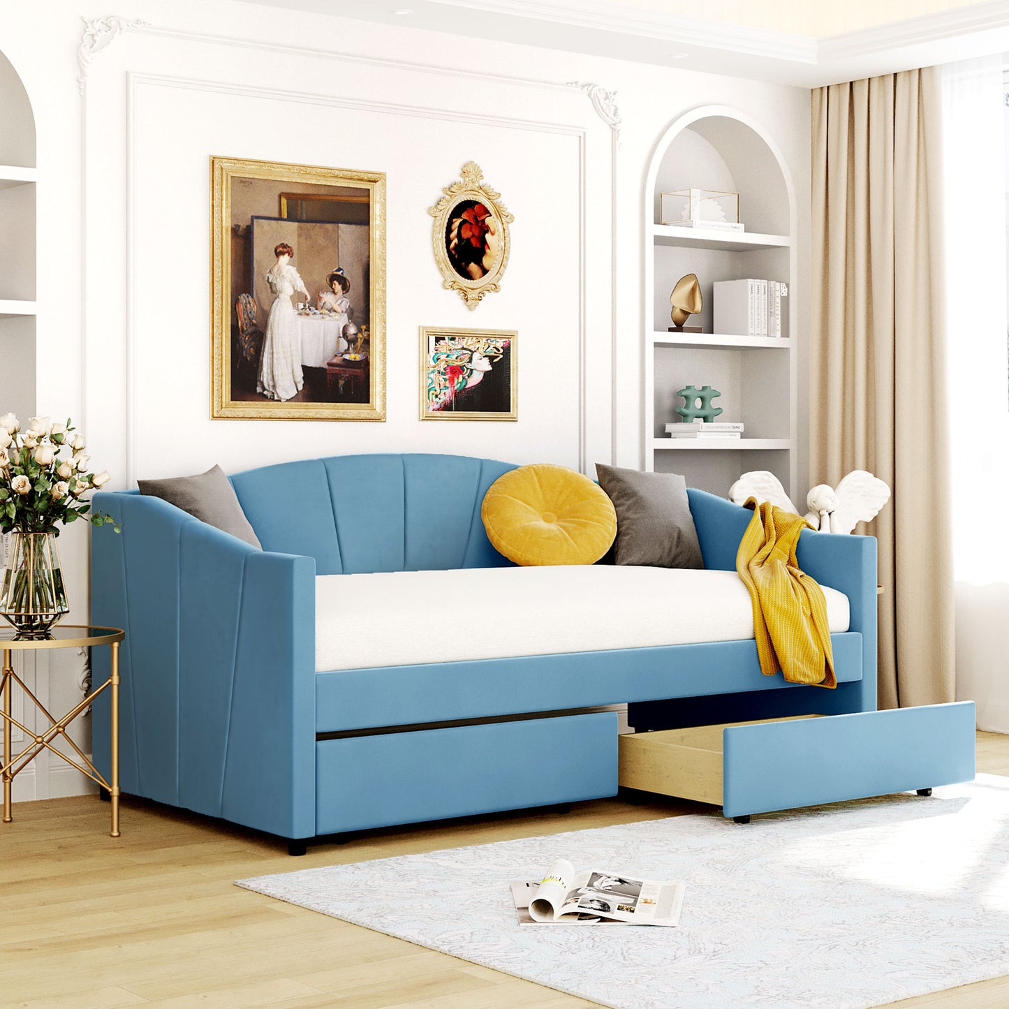 Blue upholstered daybed with pullout drawer for guest room