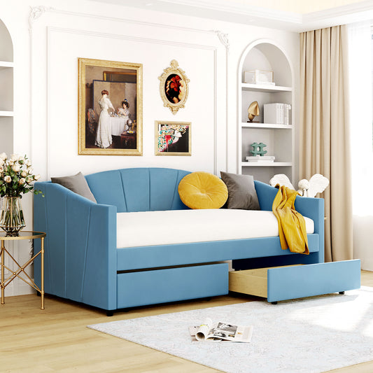 Blue upholstered daybed with pullout drawer for guest room