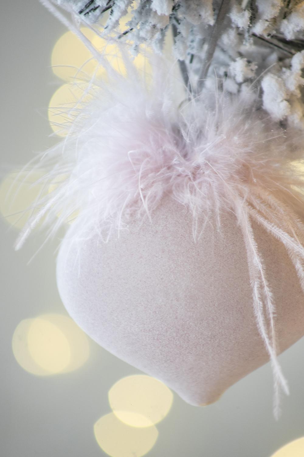 Soft pink velvet heart ornament with fluffy white feather trim